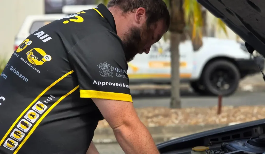 mechanic repairing an air conditioning